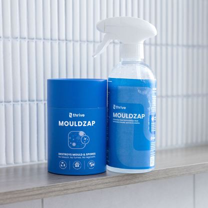MOULDZAP tub and ready-to-use mould remover spray bottle on bathroom tiles